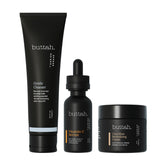 Buttah CocoShea Revitalizing Cream 2oz bottle delivers deep hydration for radiant melanin-rich skin.