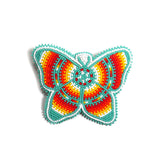 BuyBeaded butterfly turquoise hair clip showcases intricate beadwork and vibrant color