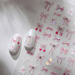 BYJKYEN Bow Nail Art Stickers glitter pink on natural nails for an easy glam look.