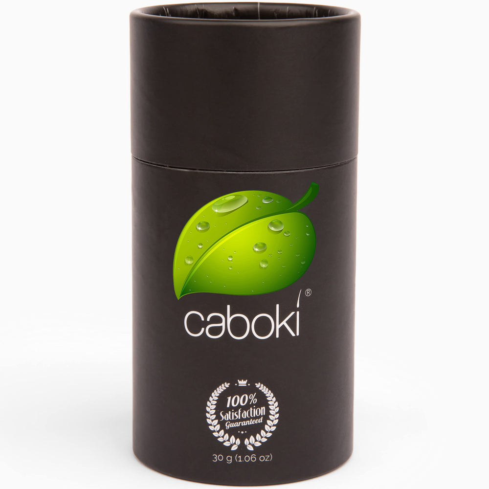 Caboki Hair Loss Concealer bottle close-up showing powder for instant thinning concealment