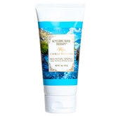 Camille Beckman glycerine hand therapy application close-up showing smooth, moisturized skin.