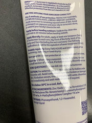Cancer Council SPF50+ lotion on skin showing protection against sun exposure.