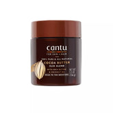 Cantu Skin Therapy Body Butter jar close-up shows rich hydration potential.