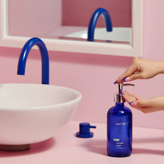 Capri Blue Volcano bottle closeup shows rich cobalt color and glass texture