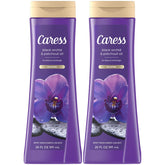 Caress Black Orchid & Patchouli bottle showing a relaxing shower ritual aroma.