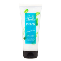 Carol's Daughter Wash Day Delight bottle pour shows easy application and hydration for curls