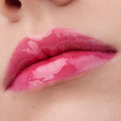 Pomegranate oil nourishes lips with radiant shine in Glossin’ Glow