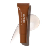 Cay Skin Isle Lip Balm SPF 30 bottle packaging highlights SPF protection and shine.
