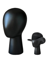 CHADWICK wig head stand with imitation wood finish for elegant salon displays.