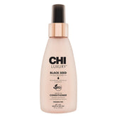 CHI Luxury Black Seed Oil Leave-In bottle detangles and hydrates for smooth styling.