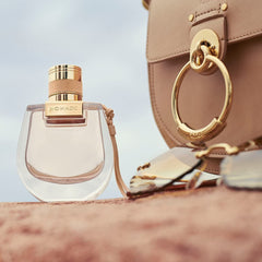 Chloe Nomade Mini box packaging showcases travel-friendly design and premium branding