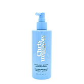 Chris McMillan Glassy Smooth Blowdry Spray bottle shows sleek, shiny finish for frizz control.