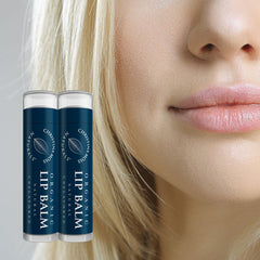 Applying Christina Moss Naturals lip balm on lips for moisture