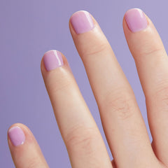 Cirque Colors Lavender Sky milky finish on nails for subtle color.