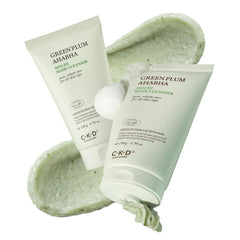 CKD Guaranteed Green Plum clay mask jar showing creamy exfoliating texture