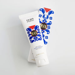 Close-up of the hand cream label highlighting paraben-free formula and plant oils.