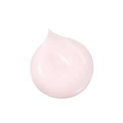 Clé de Peau Beauté Advanced Night Cream pump bottle during night routine, smooth application.