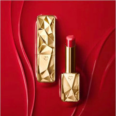 Clé de Peau Beauté Precious Lipstick Shade 2 close-up texture shows silky finish.