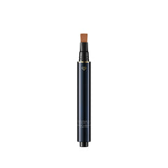 Clé de Peau Beauté Radiant Corrector for Eyes Toffee conceals dark circles with a luminous finish.