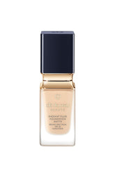 Cle de Peau Beauté Radiant Fluid Foundation bottle pump for precise coverage.