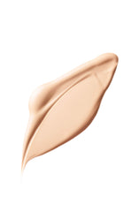 Cle de Peau Beauté Radiant Fluid Foundation swatch showing soft-focus radiance.