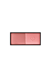 Clé de Peau blush duo Peach Tulip 103 offers silky application for a radiant, natural glow.
