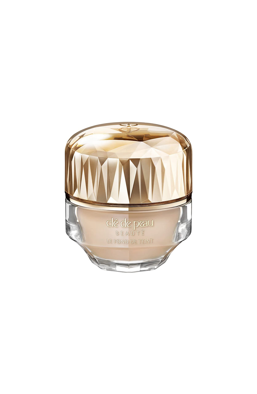 Clé de Peau Beauté foundation bottle close-up showing luxurious skincare-infused coverage