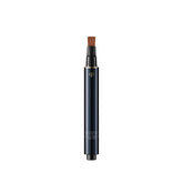 Clé de Peau Radiant Corrector Eyes Nutmeg pump for smooth, precise application.