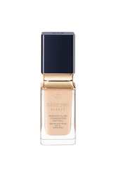 Clé de Peau Radiant Fluid Foundation bottle showing a luminous everyday glow.