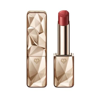 Clé de Peau The Precious Lipstick Shade 1 on lips for luminous, buildable color.