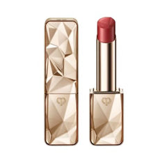 Clé de Peau The Precious Lipstick Shade 1 on lips for luminous, buildable color.