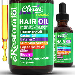 Clean Beauty Rosemary Hair Oil bottle pour for easy application and control.