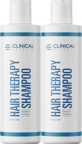 Clinical Effects Hair Therapy Shampoo bottle close-up showing premium biotin formula for fuller hair.