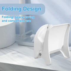 CLIO anti-slip shower foot rest on smooth tile surface for safe showers.