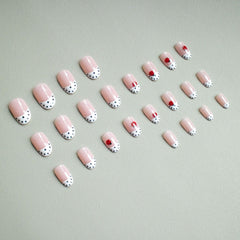 CnSybaris glossy white tips for a timeless french manicure