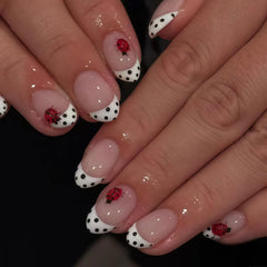 CnSybaris polka-dot french-tip nails for quick at-home styling
