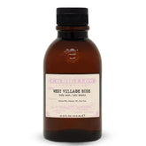 C.O. Bigelow West Village Rose Body Wash bottle on a bathroom shelf, moisturizing formula.