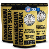 Coach Soak Recovery Bath Soak bottle pouring magnesium flakes for post-workout relaxation.