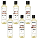 COCOCARE Vitamin E Body Oil bottle pour provides daily hydration for all skin types.