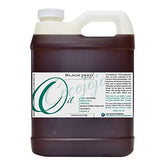 Cocojojo Black Seed Oil bottle pour showing versatile skin and hair nourishment.