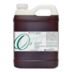 Cocojojo Black Seed Oil label close-up highlighting purity and cold-pressed extraction.