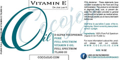 Close-up of Cocojojo bottle label highlighting undiluted vitamin E