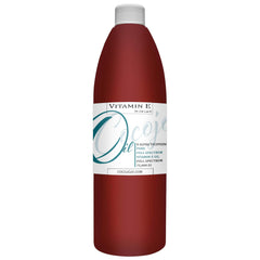 Cocojojo Vitamin E Oil demonstrated for skin and hair care and hydration.