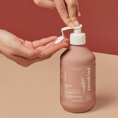 Cocokind Sake Body Lotion being massaged into skin for smoothing