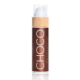 COCOSOLIS CHOCO Suntan bottle pouring; rich organic oils aid a luxurious tan.