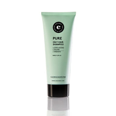 COCUNAT Pure Shampoo bottle for oily hair with detox and volume benefits