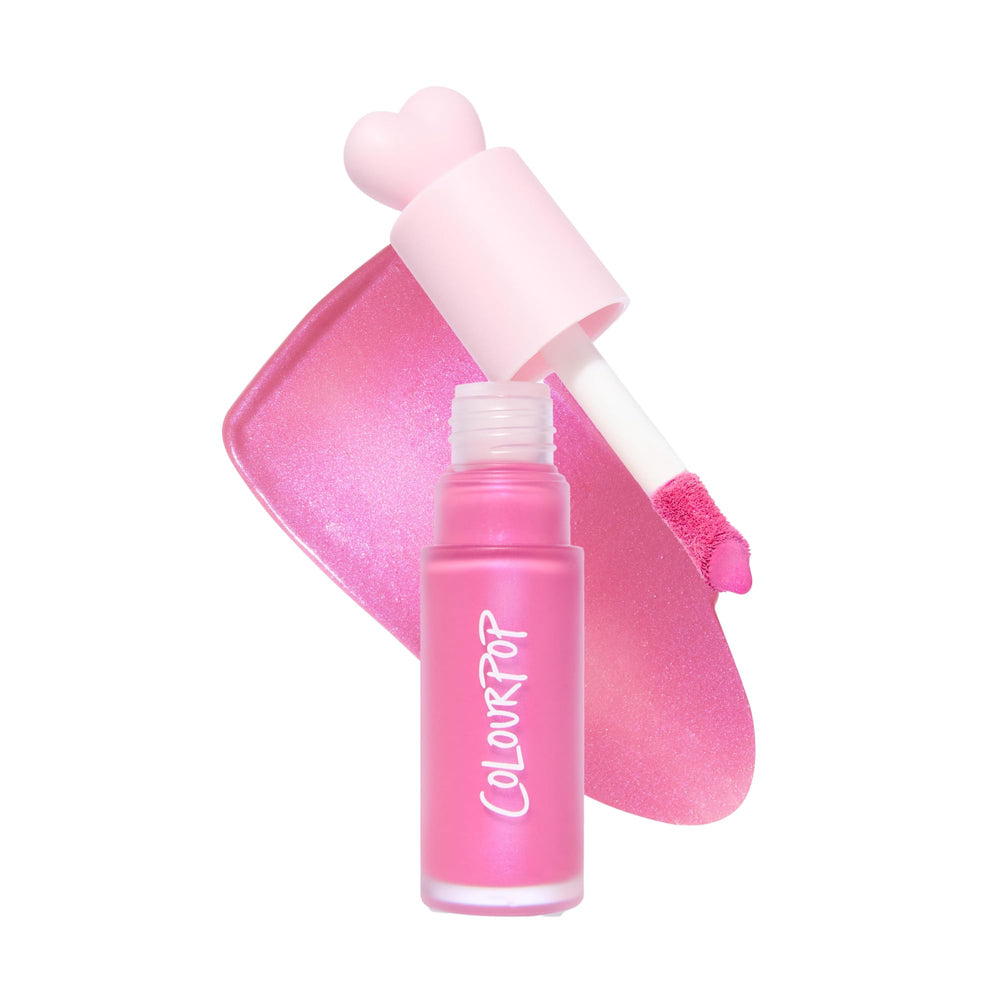 ColourPop Weightless Liquid Blush Sweet Treat bottle pour shows precise color control.