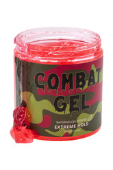 Combat Gel extreme hold bottle with watermelon scent for all-day styling.