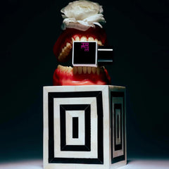 Confessions of a Rebel Bite Me EDP bottle in hand conveys confidence for on the go wear