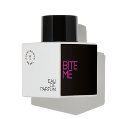 Confessions of a Rebel Bite Me EDP bottle pour evokes a bold, lasting scent for confident evenings.